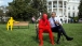 President Barack Obama sits with a Lego statue