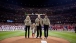 First Lady Michelle Obama And Dr. Jill Biden Stand For The National Anthem