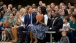 Prince Harry of Wales Hands First Lady Michelle Obama a Basketball