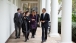 President Obama Walks with Senior Advisors on the Colonnade of the White House