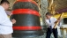 President Barack Obama Rings A Bell