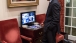 President Obama Watches Coverage Of Nelson Mandela