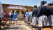 Dr. Jill Biden and Zambian Second Lady Dr. Charlotte Scott greet students