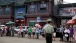 People Line Up on the Street in Bejing to watch Vice President Joe Biden's motorcade