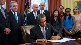 President Obama signs the 