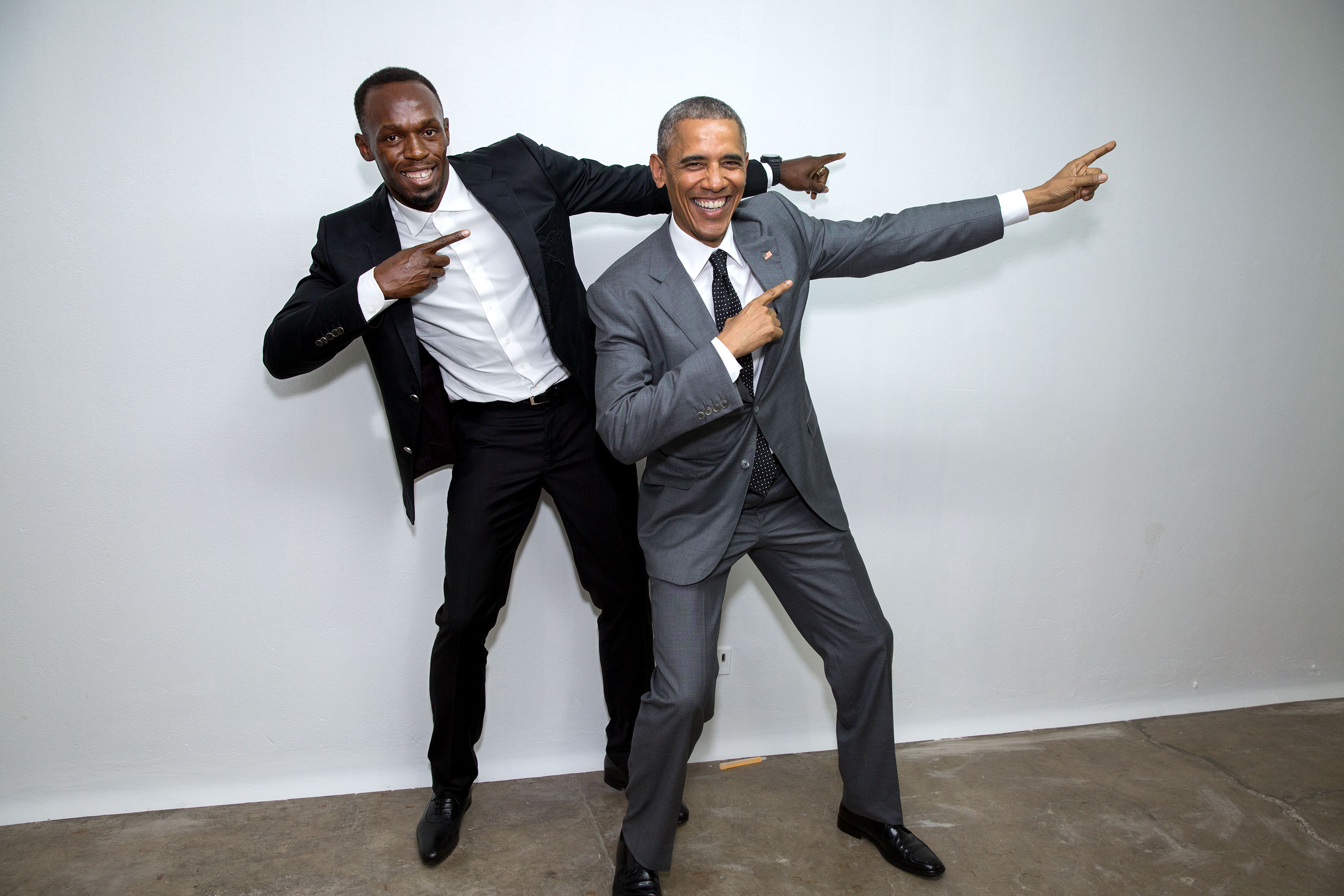 Backstage, the President mimics the victory pose with Usain Bolt, the fastest runner in the world. Bolt, the Jamaican sprinter, attended the town hall. (Official White House Photo by Pete Souza)