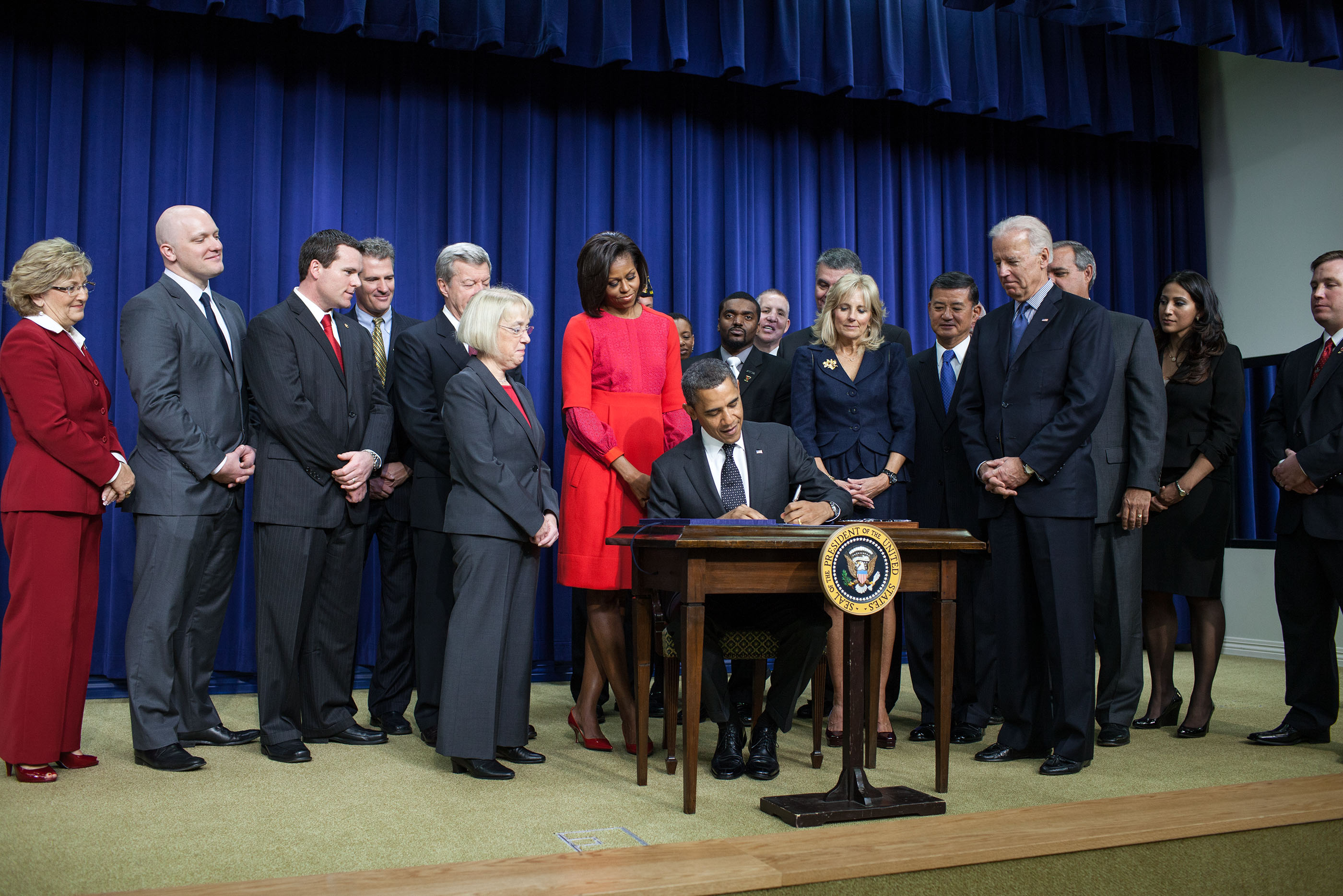The President signs the Veterans Opportunity to Work to Hire Heroes Act of 2011 at the Eisenhower Executive Office Building, Nov. 21, 2011. (Official White House Photo by Pete Souza)