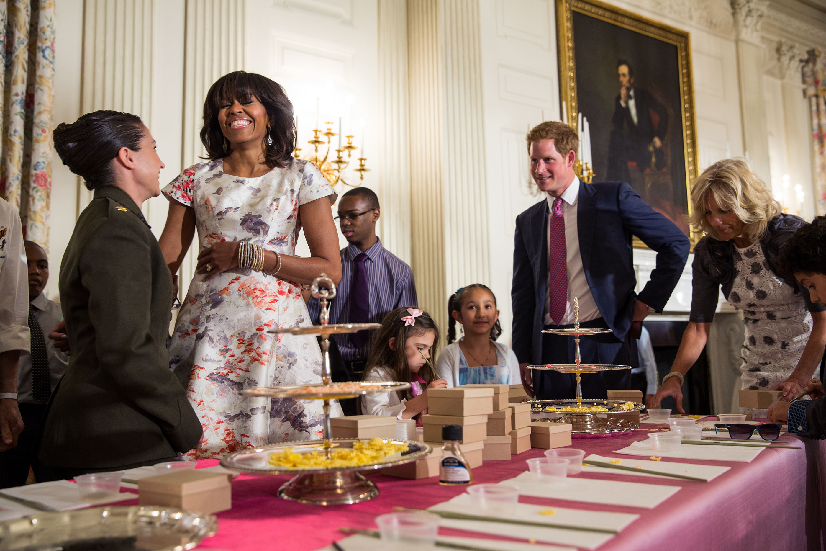 The First Lady, Dr. Biden and Prince Harry of Wales help military children create Mother's Day cards in the State Dining Room of the White House, May 9, 2013.  (Official White House Photo by Lawrence Jackson)