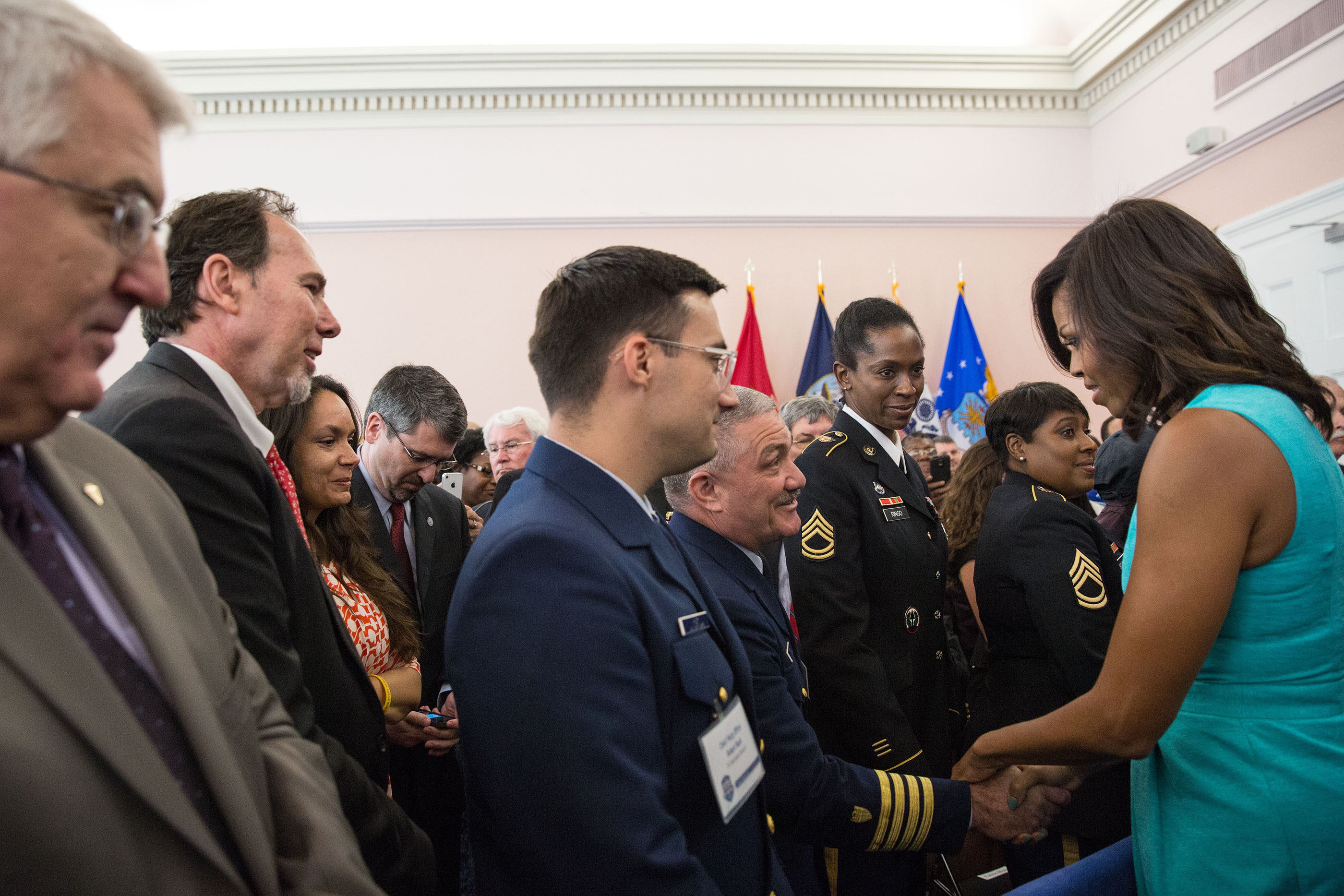 The First Lady greets veterans in the audience after delivering remarks at the “Mayor's Challenge to End Veteran Homelessness” in New Orleans, La., April 20, 2015. (Official White House Photo by Amanda Lucidon)