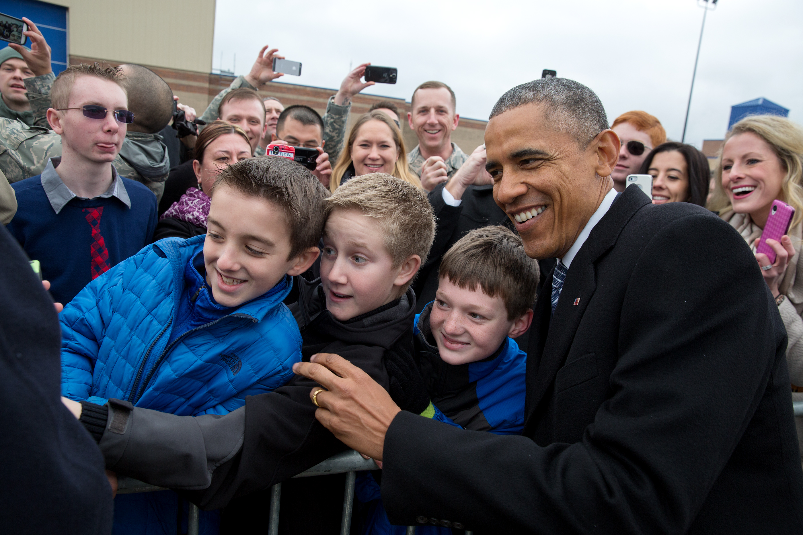 Idaho, Jan. 21, 2015. Posing for a photo with kids at Boise Airport. (Official White House Photo by Pete Souza)