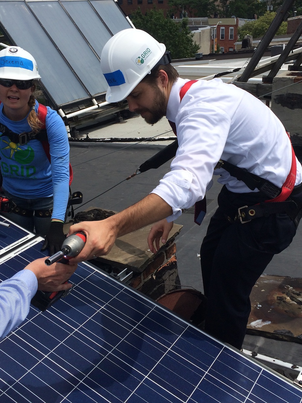 Senior Advisor Brian Deese installs solar panels