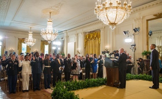 President Barack Obama Listens During Naturalization Ceremony