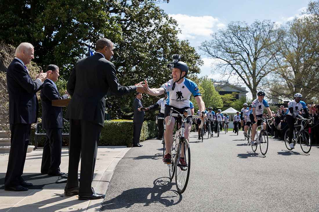 President Barack Obama, Vice President Joe Biden and Veterans Affairs Secretary Eric K. Shinseki welcome the Wounded Warrior Project's Soldier Ride to the South Lawn of the White House in celebration of the seventh annual Soldier Ride, April 17, 2014.