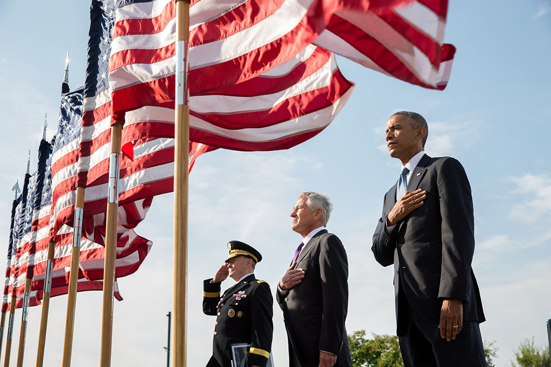 President Obama, Defense Secretary Hagel, and Gen. Martin Dempsey listen to the national anthem, Sept. 11, 2014