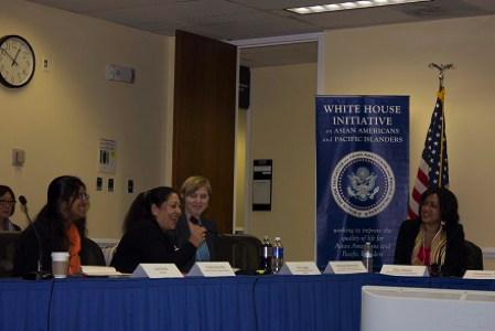 A domestic worker speaks at the salon and domestic work briefing