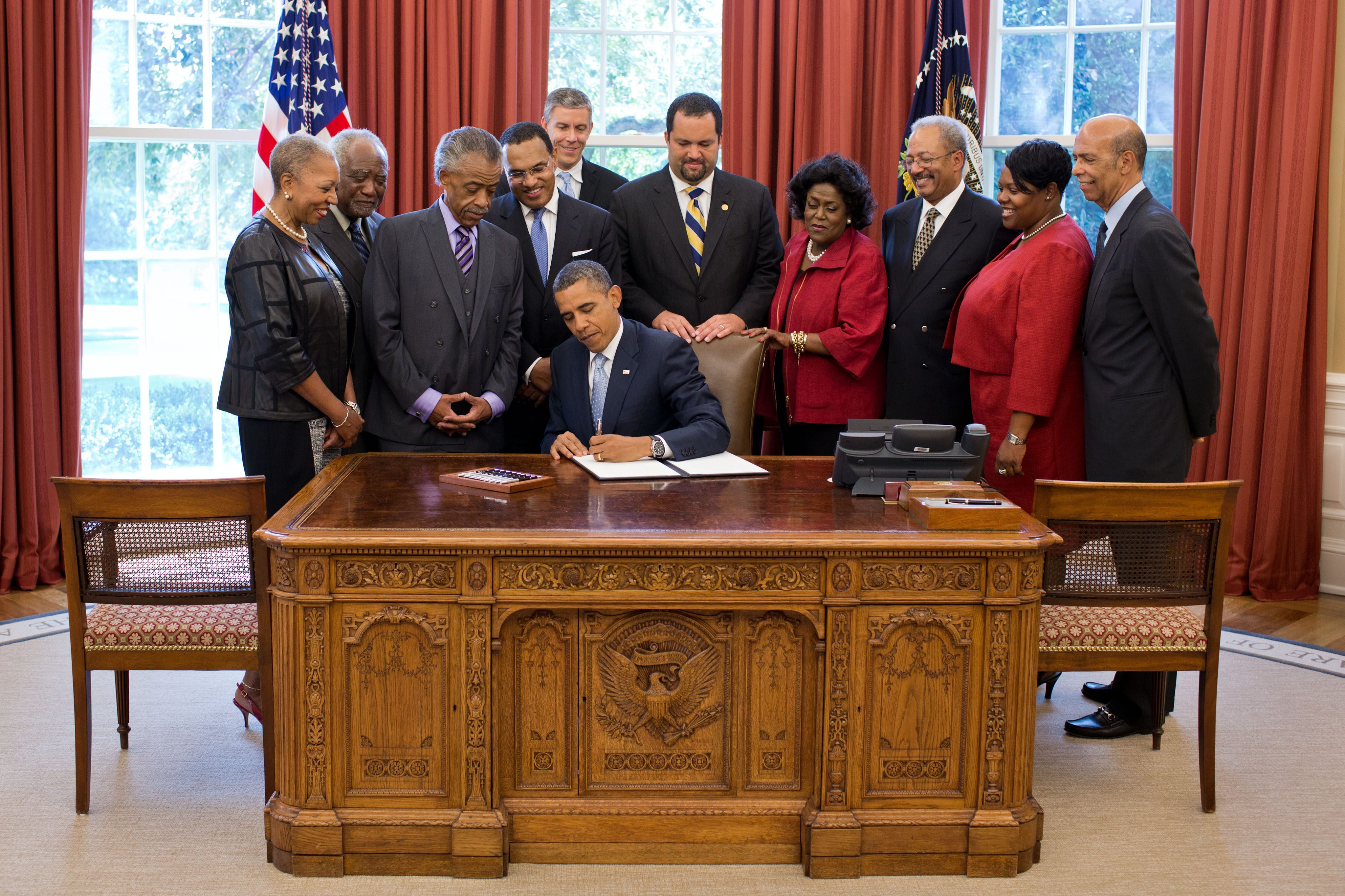 President Barack Obama signs the White House Initiative on Educational Excellence for African Americans Executive Order (July 26, 2012)