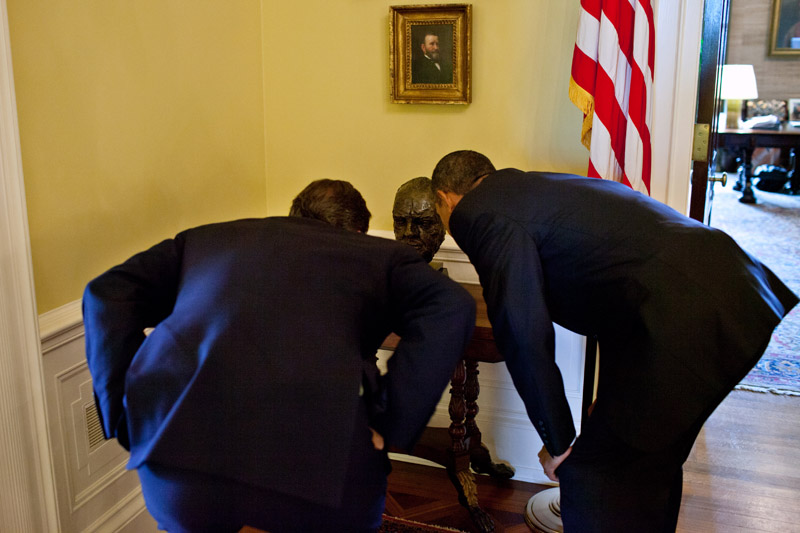 President Barack Obama shows Prime Minister David Cameron of the United Kingdom a bust of Sir Winston Churchill (July 20, 2010)