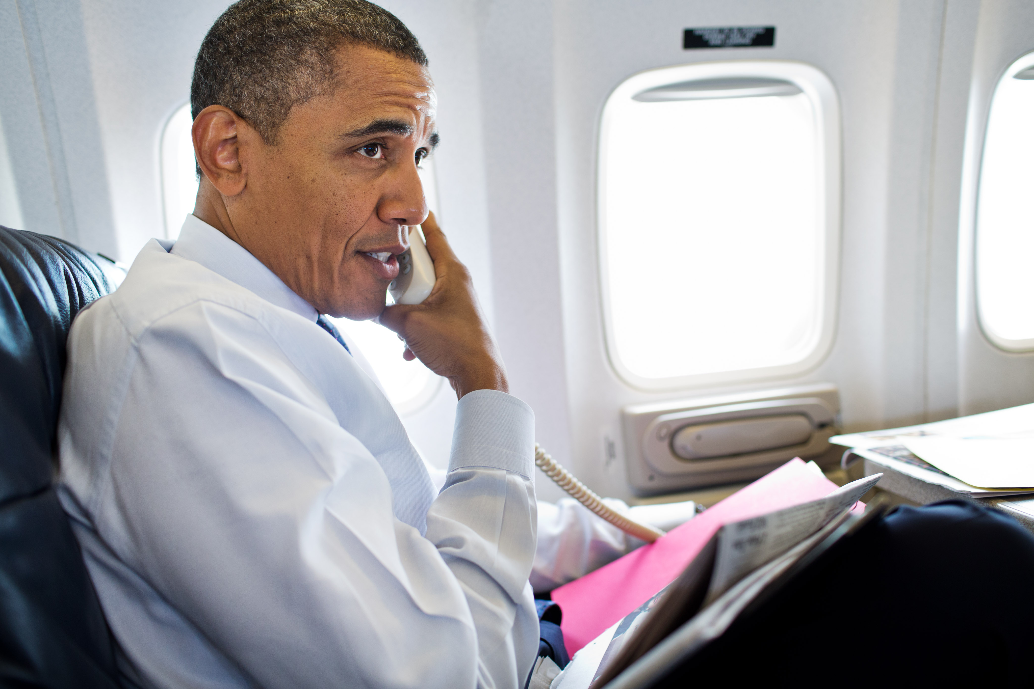 President Barack Obama talks on the phone with members of the U.S. Olympic women's gymnastics team (August 1, 2012)