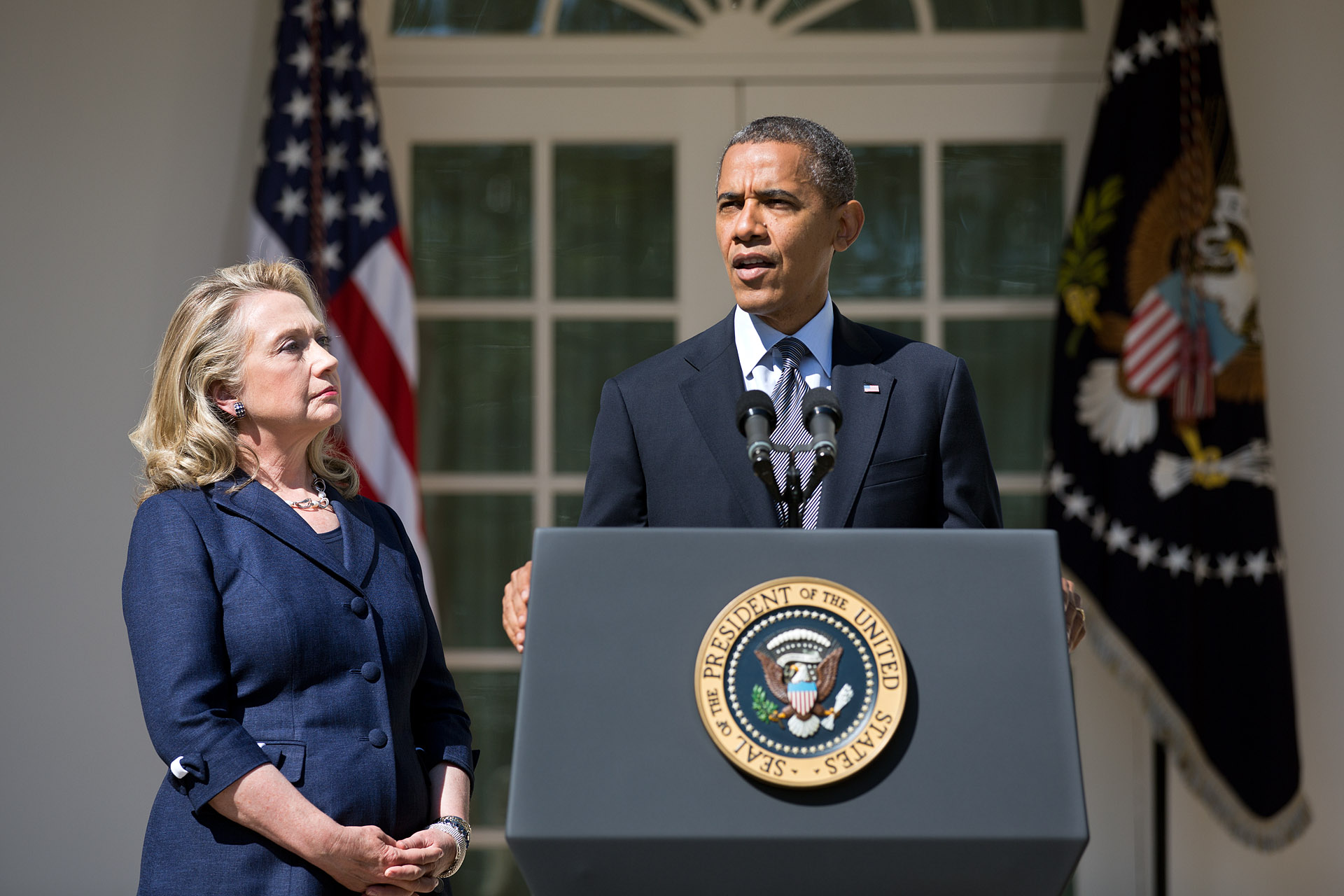 President Barack Obama, with Secretary of State Hillary Rodham Clinton, delivers a statement regarding the attack on the U.S. consulate in Benghazi, Libya (September 12, 2012)