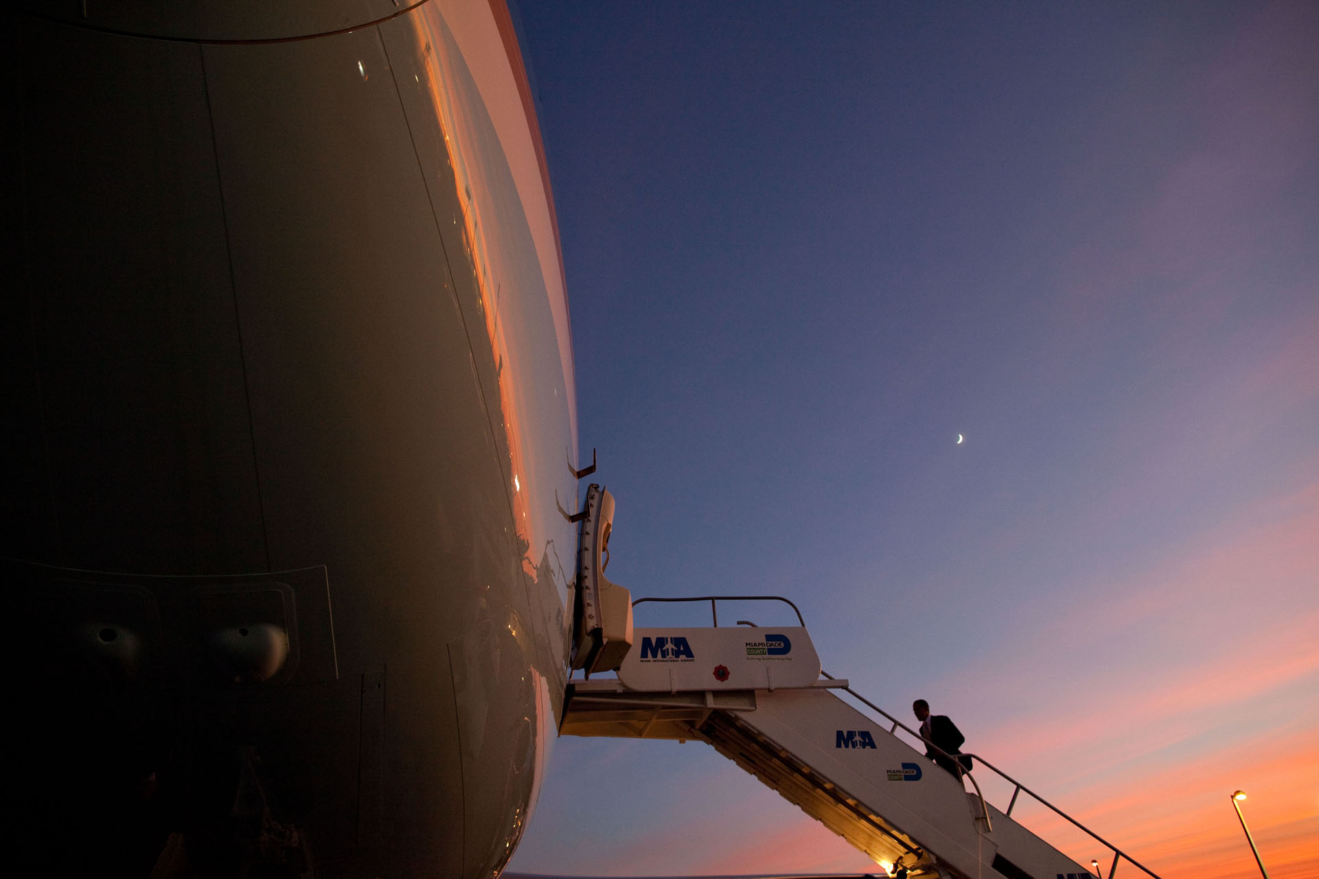 The President Boards Air Force One with a Sunset Backdrop