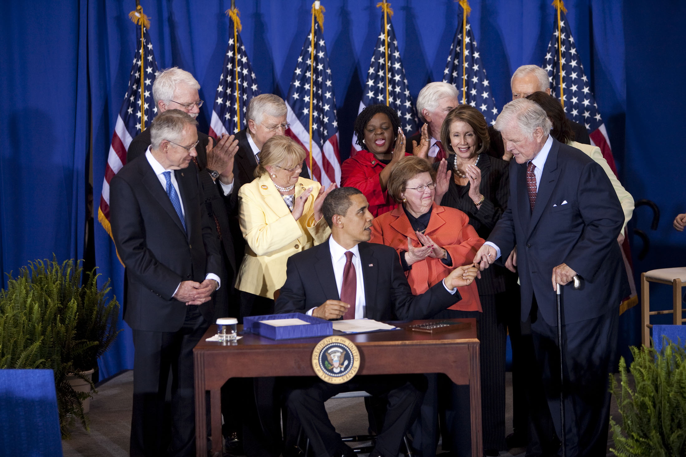 President Barack Obama signs H.R. 1388, the Edward M. Kennedy Serve America Act