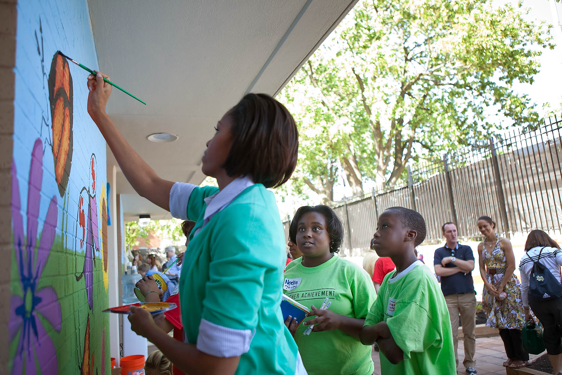 First Lady Paints Butterfly on Mural