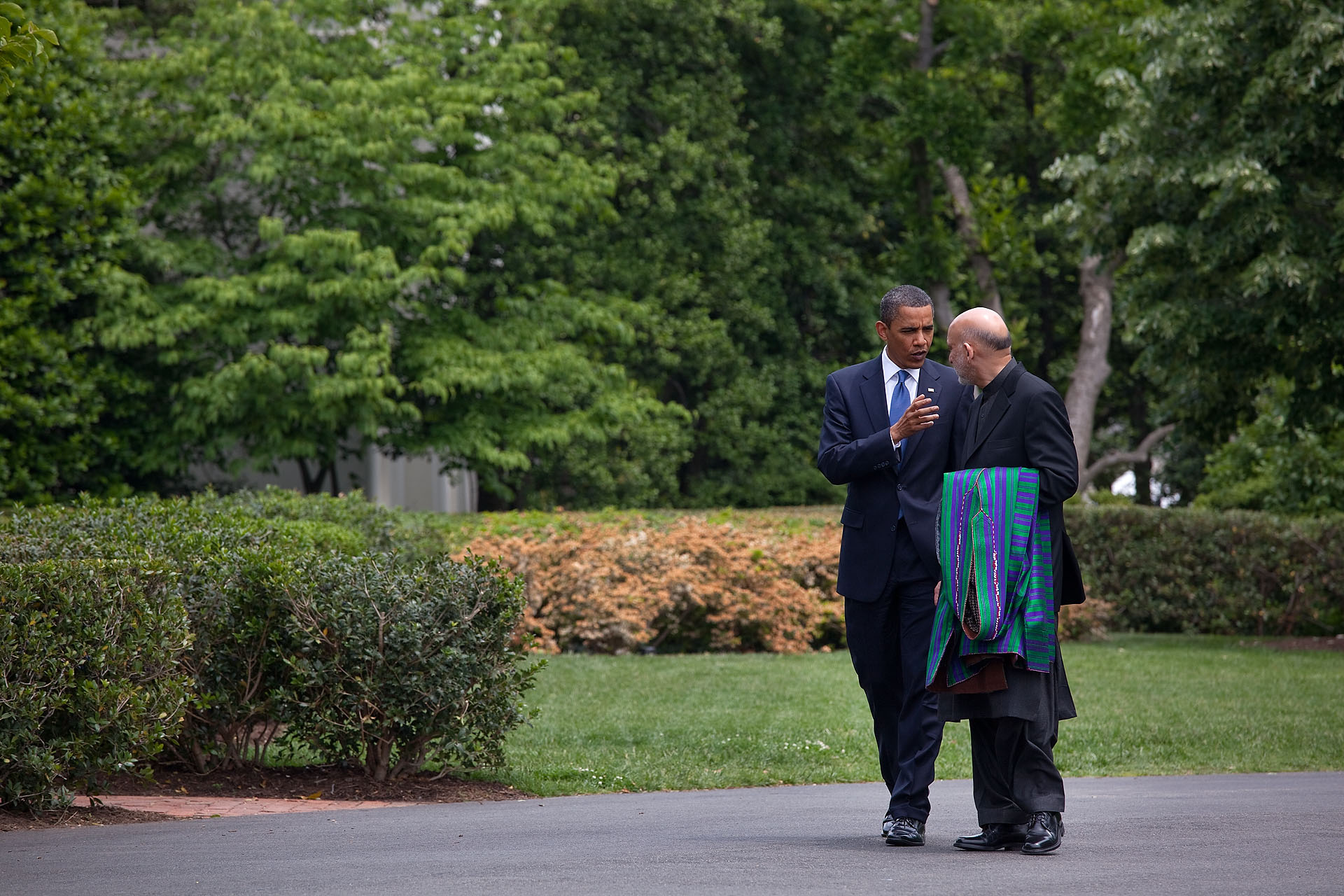 President Obama and President Karzai Walk along the South Lawn