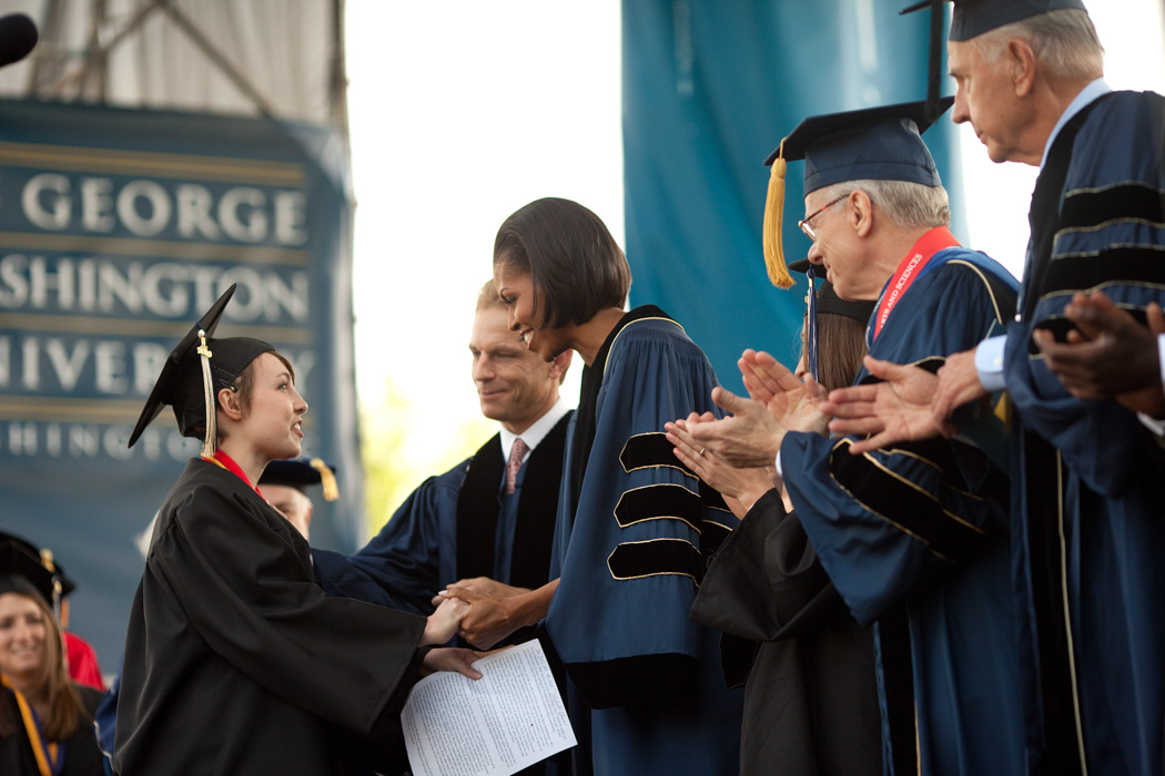 First Lady Michelle Obama greets GWU graduate Zoe Petkanas