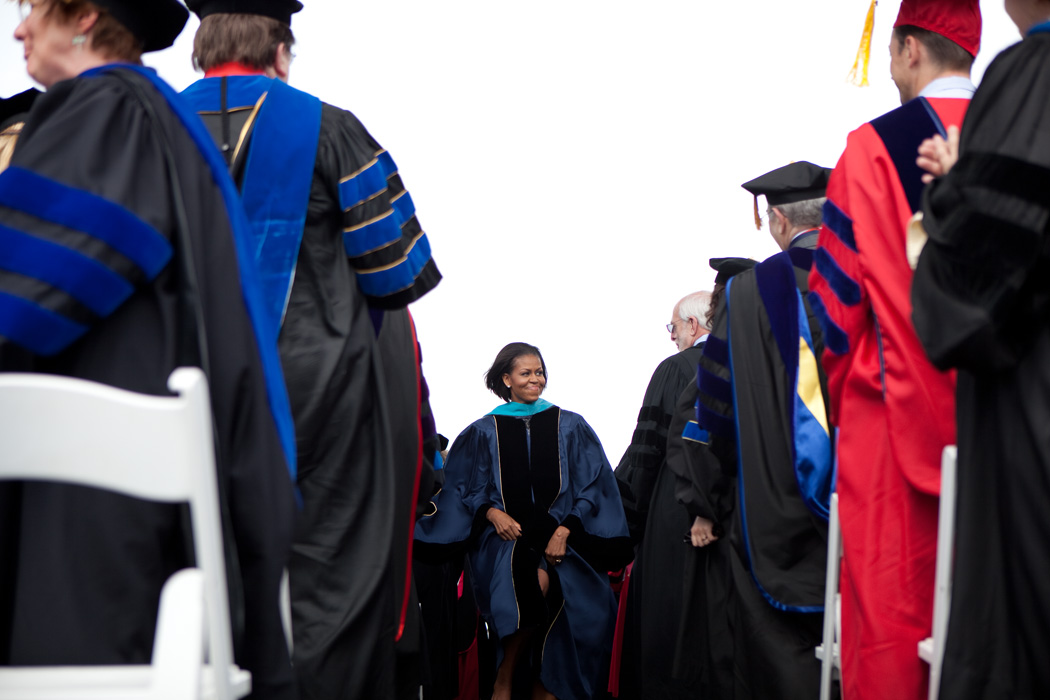 Michelle Obama stands on stage during the GWU commencement ceremony