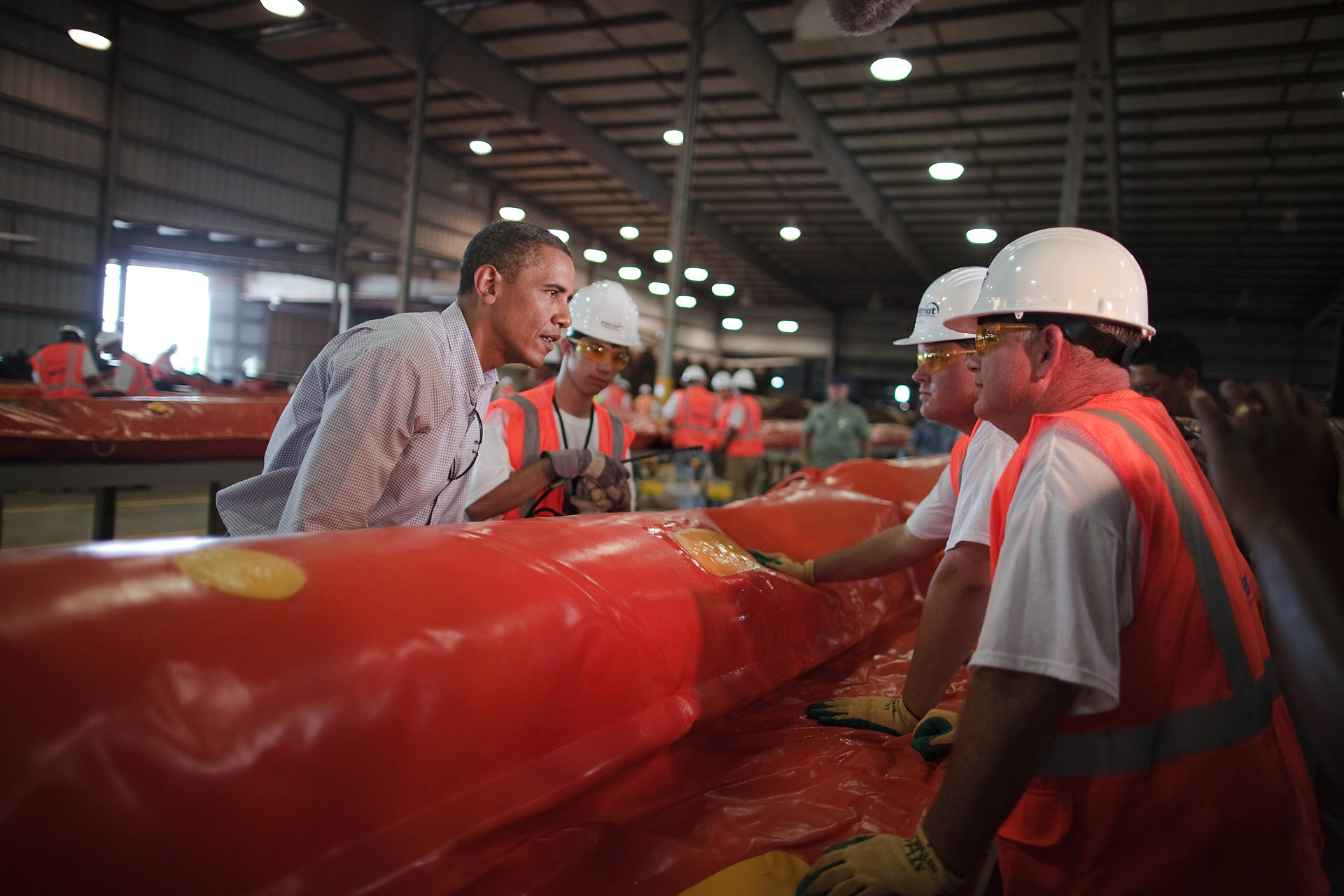 President Obama and workers in Theodore Staging Facility
