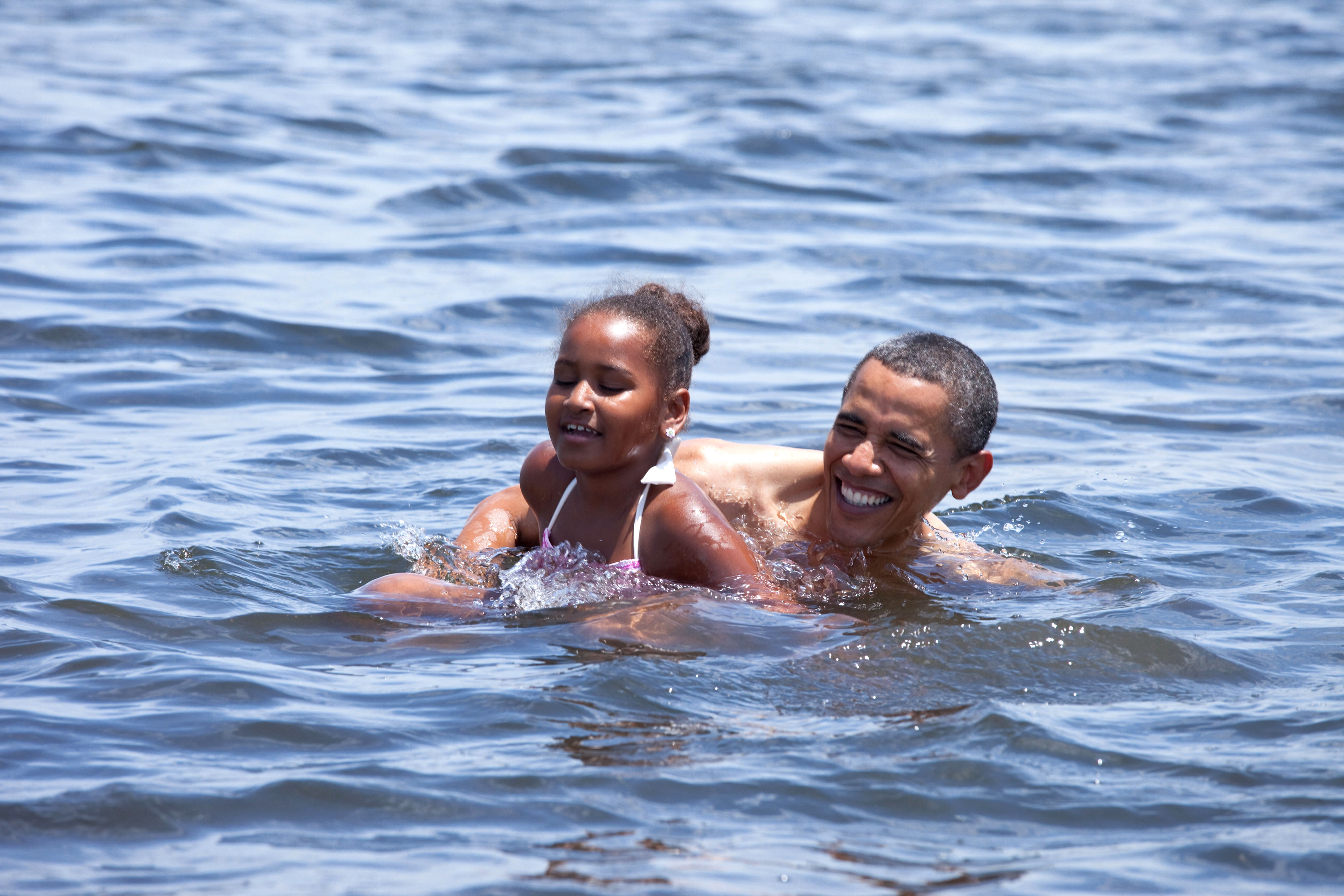 President and Sasha swim
