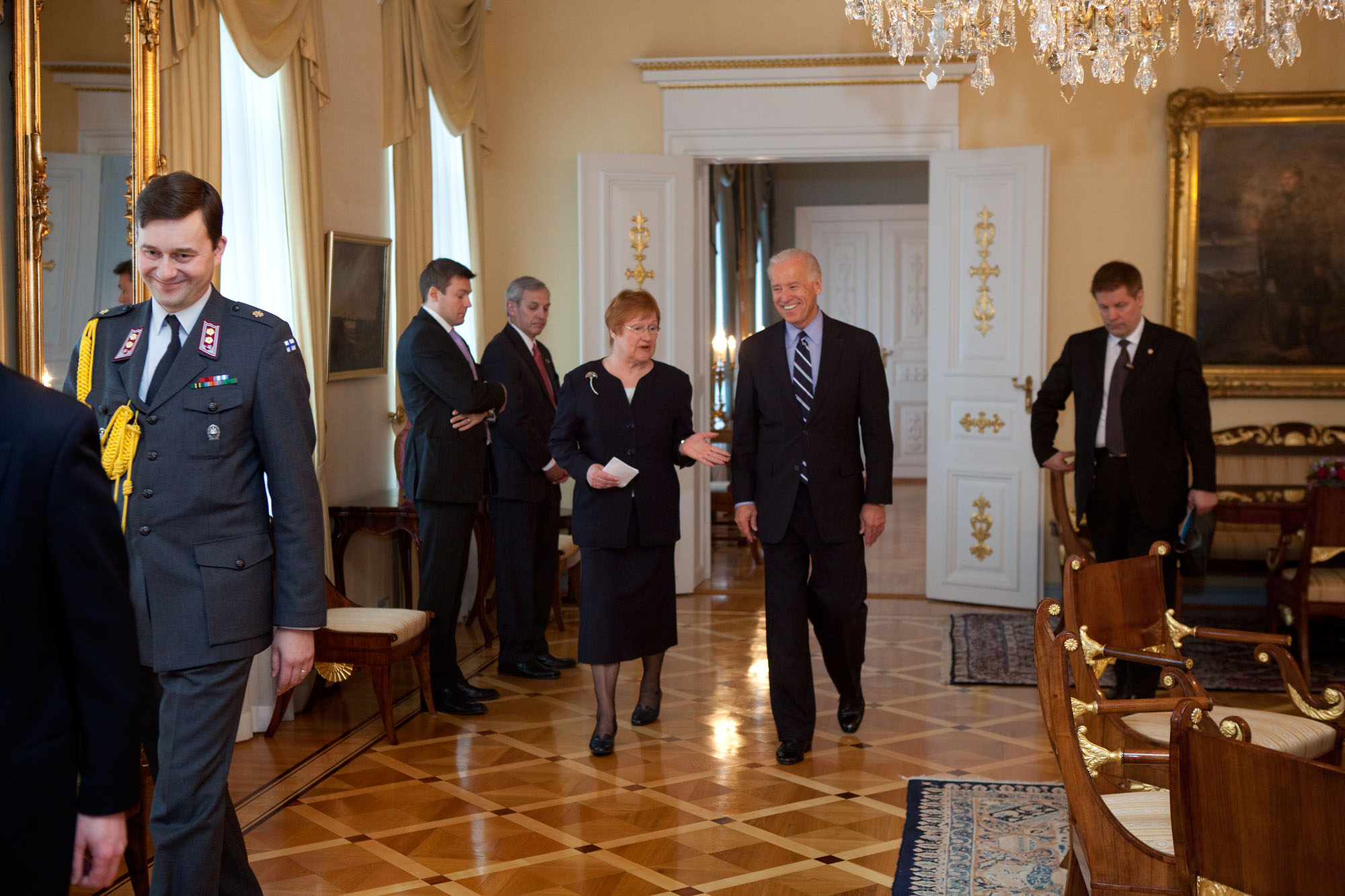 Vice President Joe Biden walks with with Finnish President Tarja Halonen
