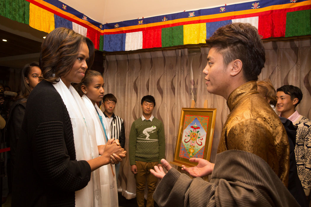 The First Lady is greeted by Tibetan students
