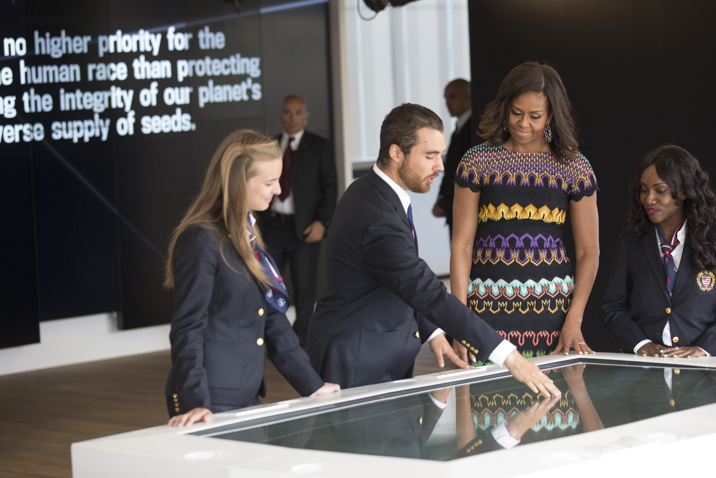 First Lady Michelle Obama watches a interactive game demo