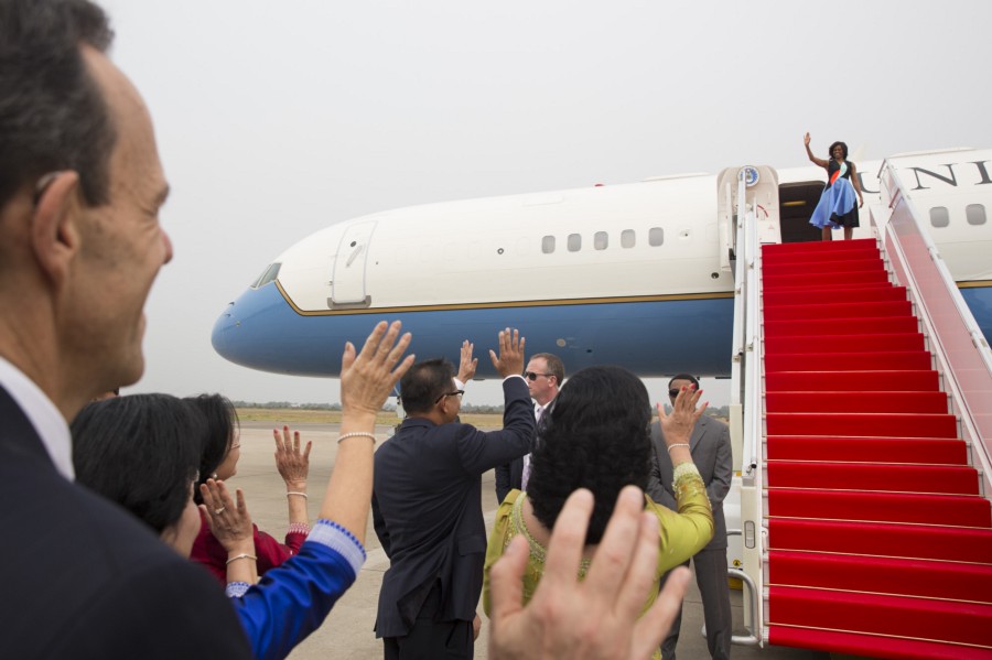 First Lady Michelle waves upon departure from Siem Reap Airport in Siem, Reap
