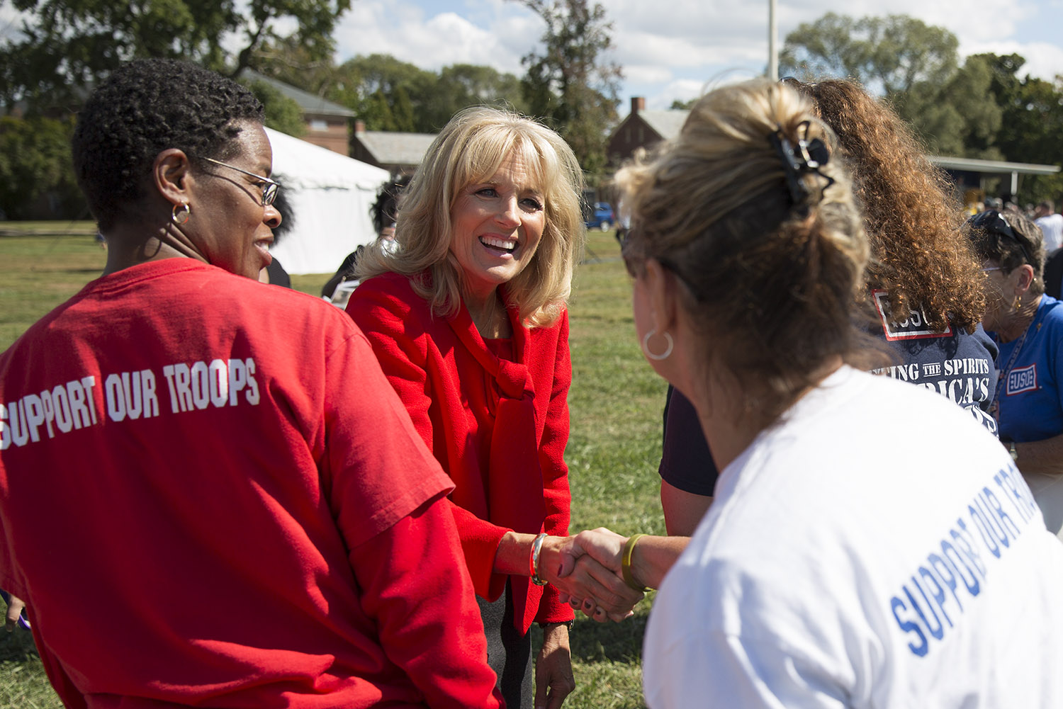 Dr. Jill Biden greets members of the USO after a homecoming ceremony