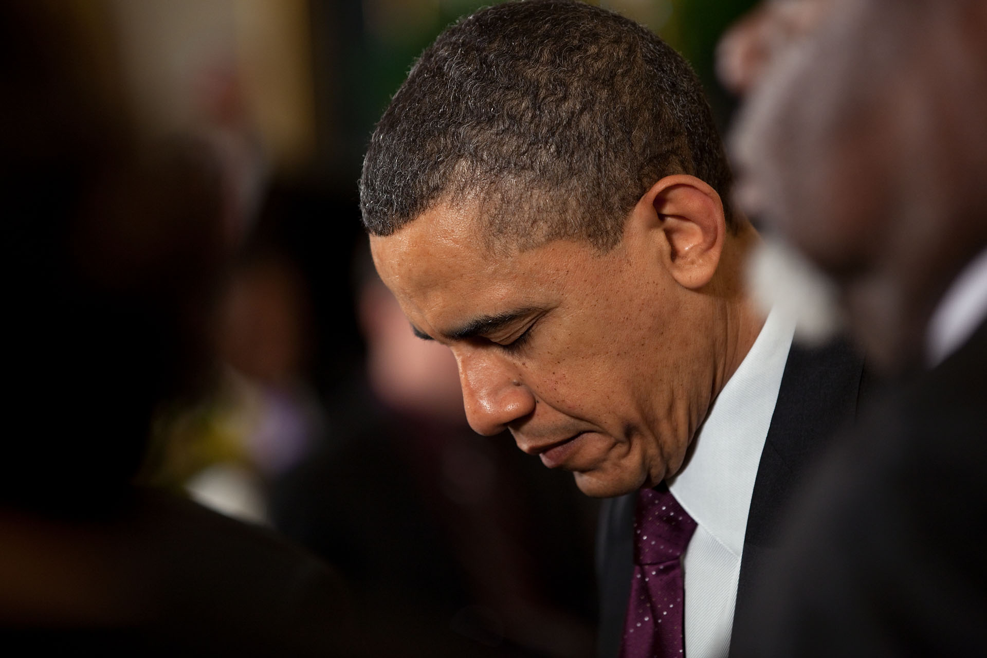 President Barack Obama Bows His Head During the Easter Prayer Breakfast in the East Room of the White House