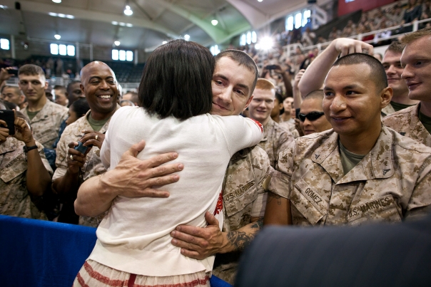 FLOTUS hugging a member of the military