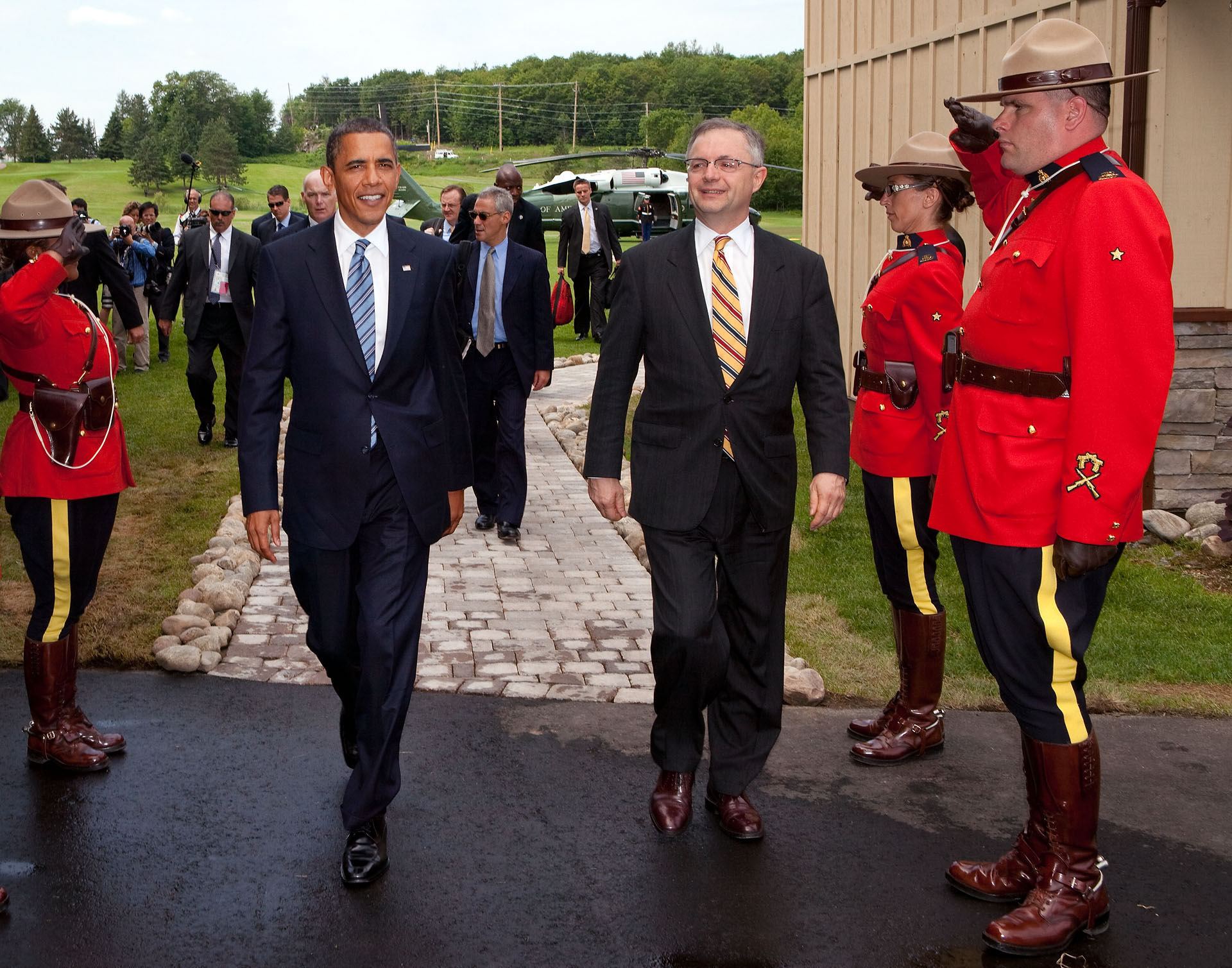 President Barack Obama is Saluted by a Royal Canadian Mounted Police Officers at G8 Summit in Canada