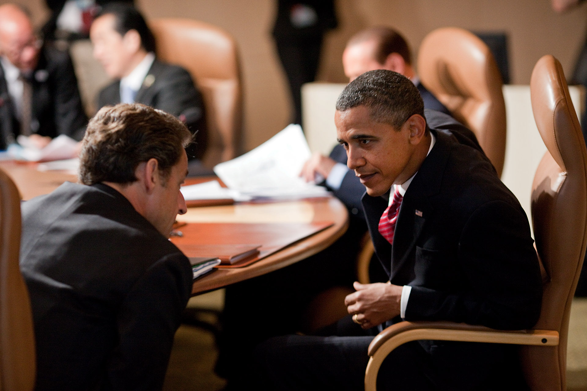 President Barack Obama talks with President Nicolas Sarkozy of France at G8 Summit