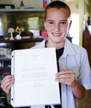 Student James Henderson with a Letter from President Obama