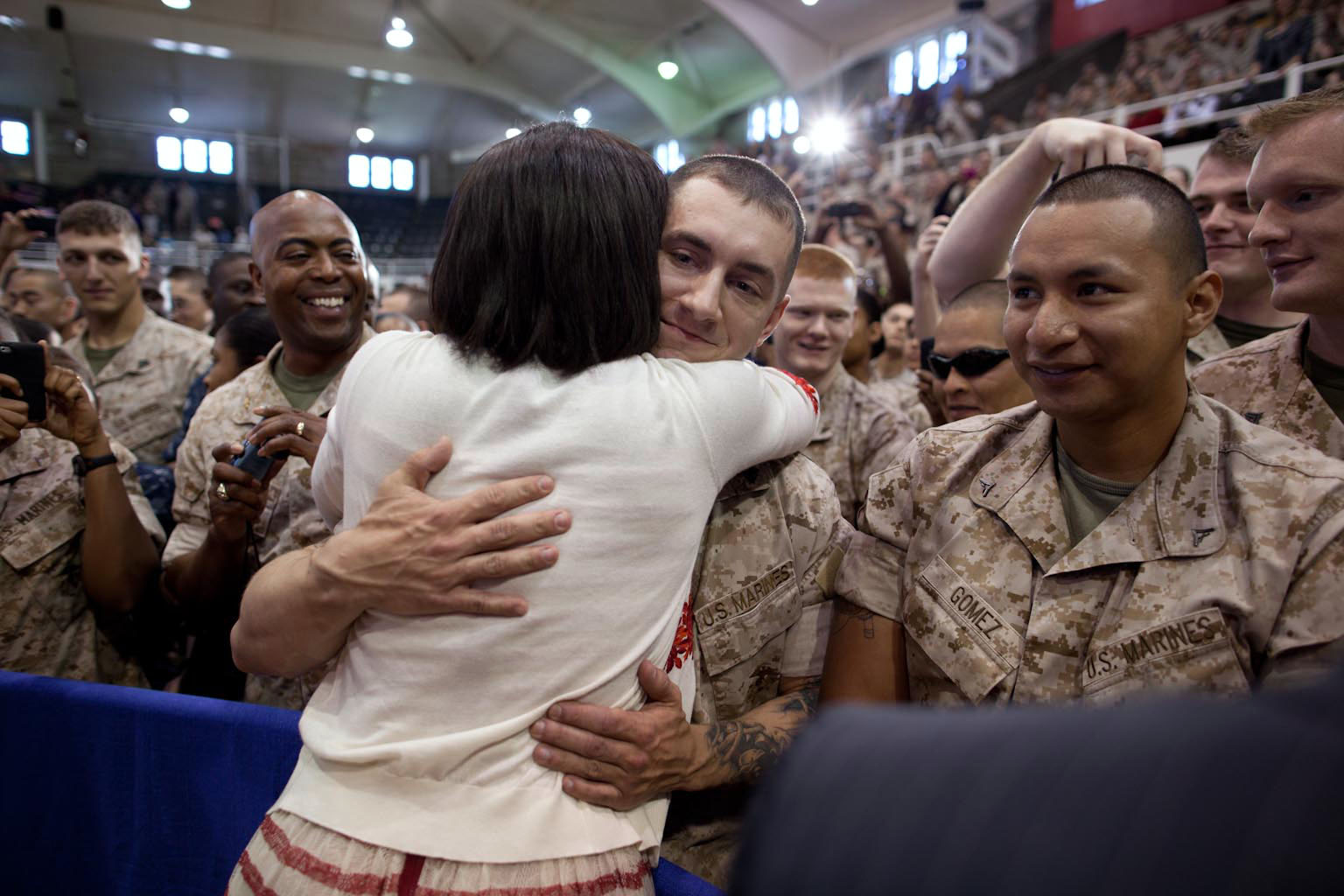 First Lady Michelle Obama greets Marines following her remarks to the base community at Goettge Memorial Field House at Camp Lejeune, N.C., 