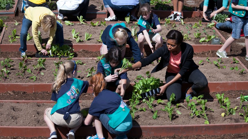 First Lady Michelle Obama joins students for the spring White House Kitchen Garden planting on the South Grounds