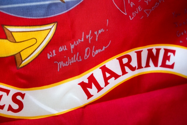 A message written by First Lady is seen on a U.S. Marine Corps flag