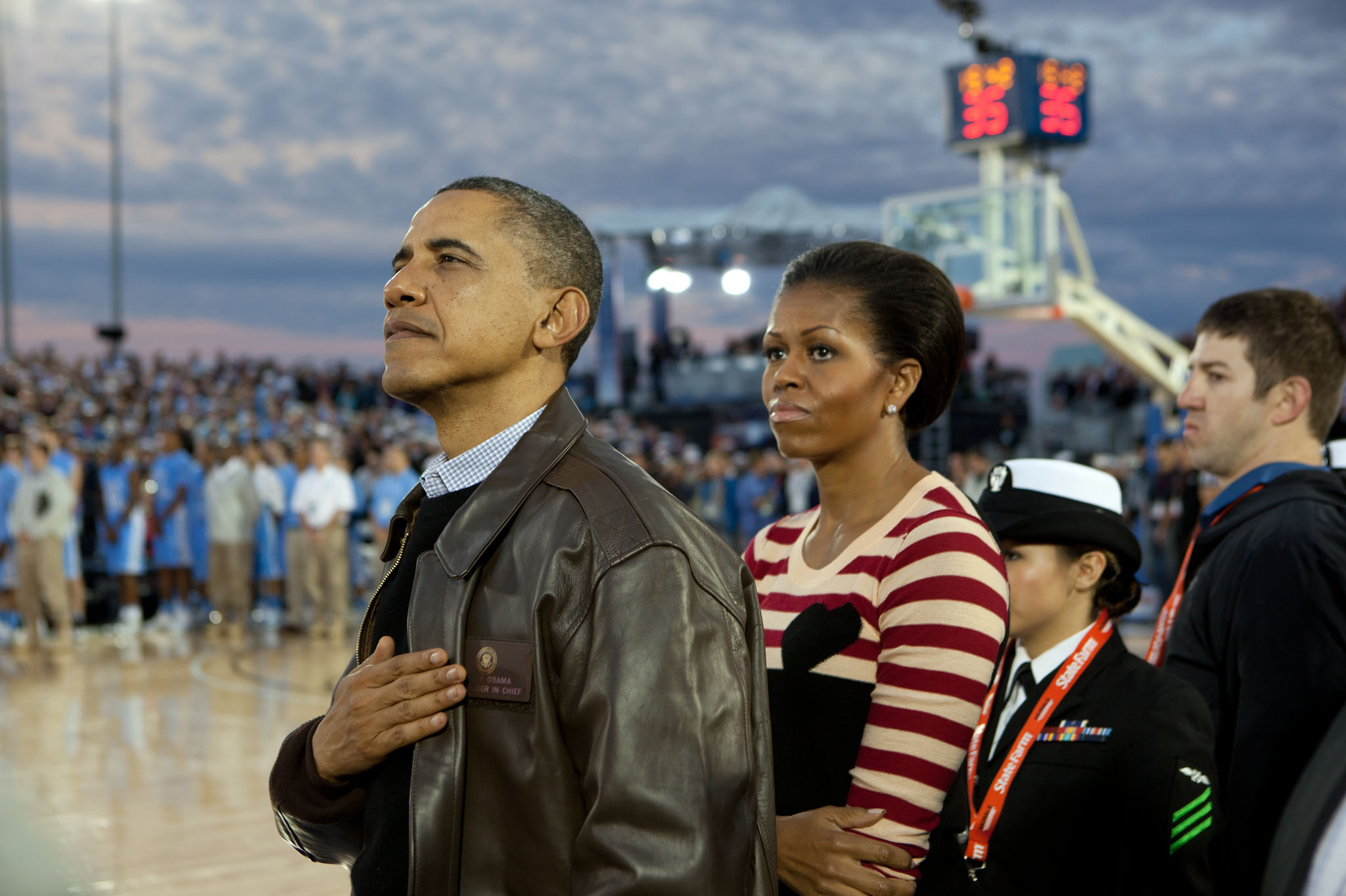 President Obama And The First Lady Watch The Retiring Of The Colors