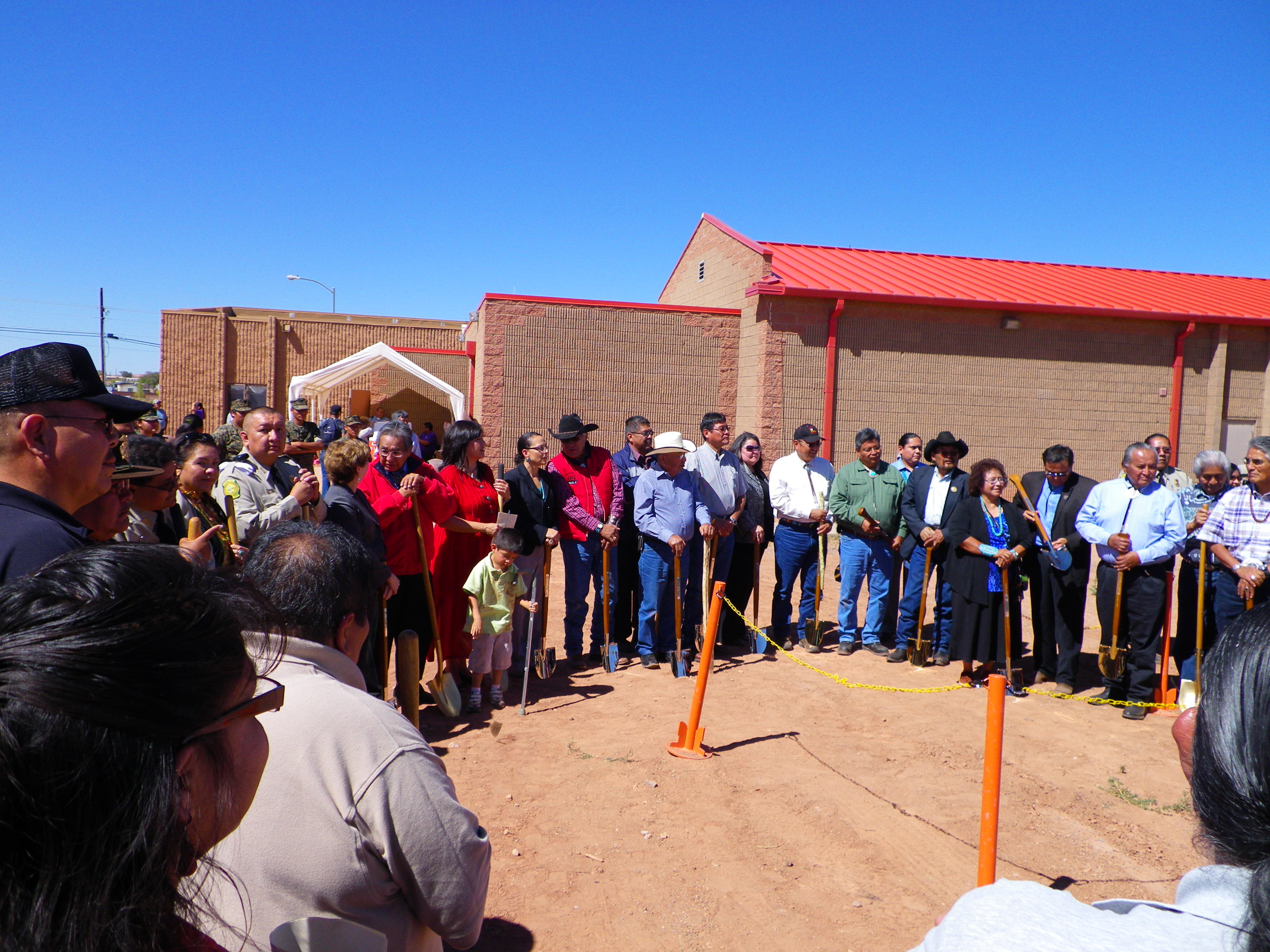 Jodi Gillette of the Office of Public Engagement Stands with Navajo Nation Officials 