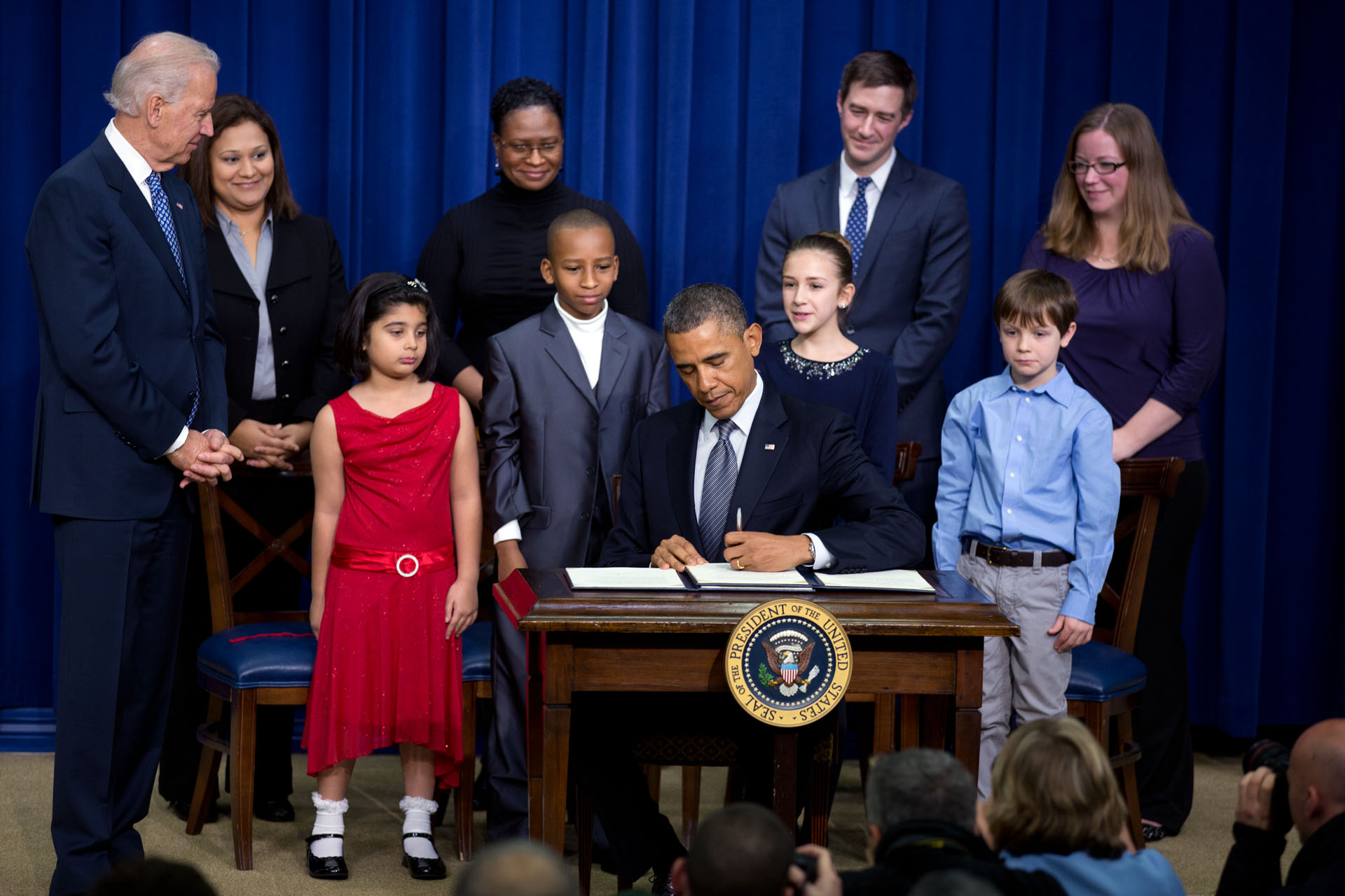President Barack Obama signs executive orders initiating 23 executive actions on gun control, Jan 16, 2013