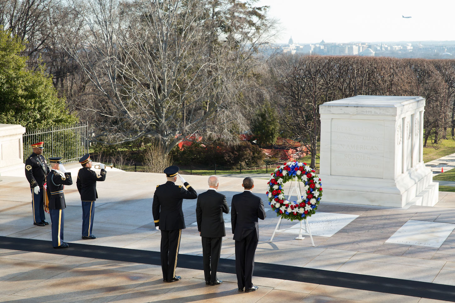 President Barack Obama and Vice President Joe Biden pause during a wreath laying ceremony at the Tomb of the Unknowns