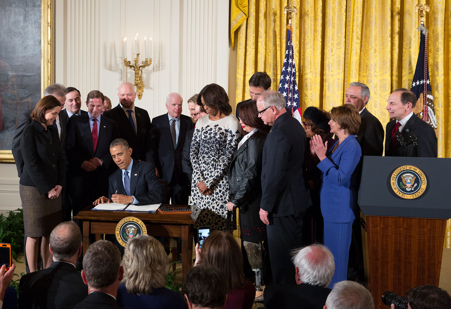 President Barack Obama signs the Clay Hunt Suicide Prevention for American Veterans Act