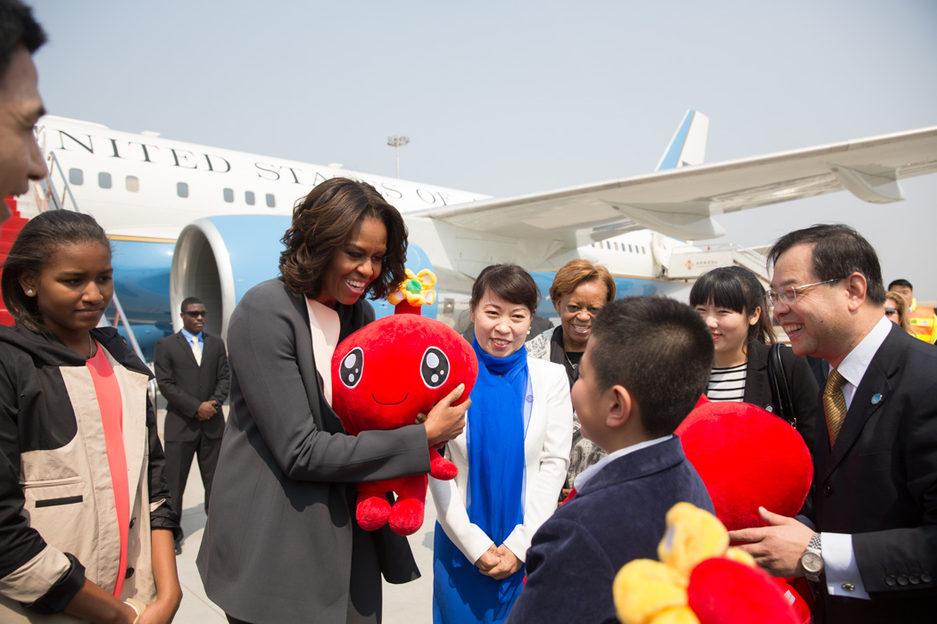First Lady Michelle Obama, Sasha, Malia and Marian Robinson are greeted upon arrival to Xi'an, China